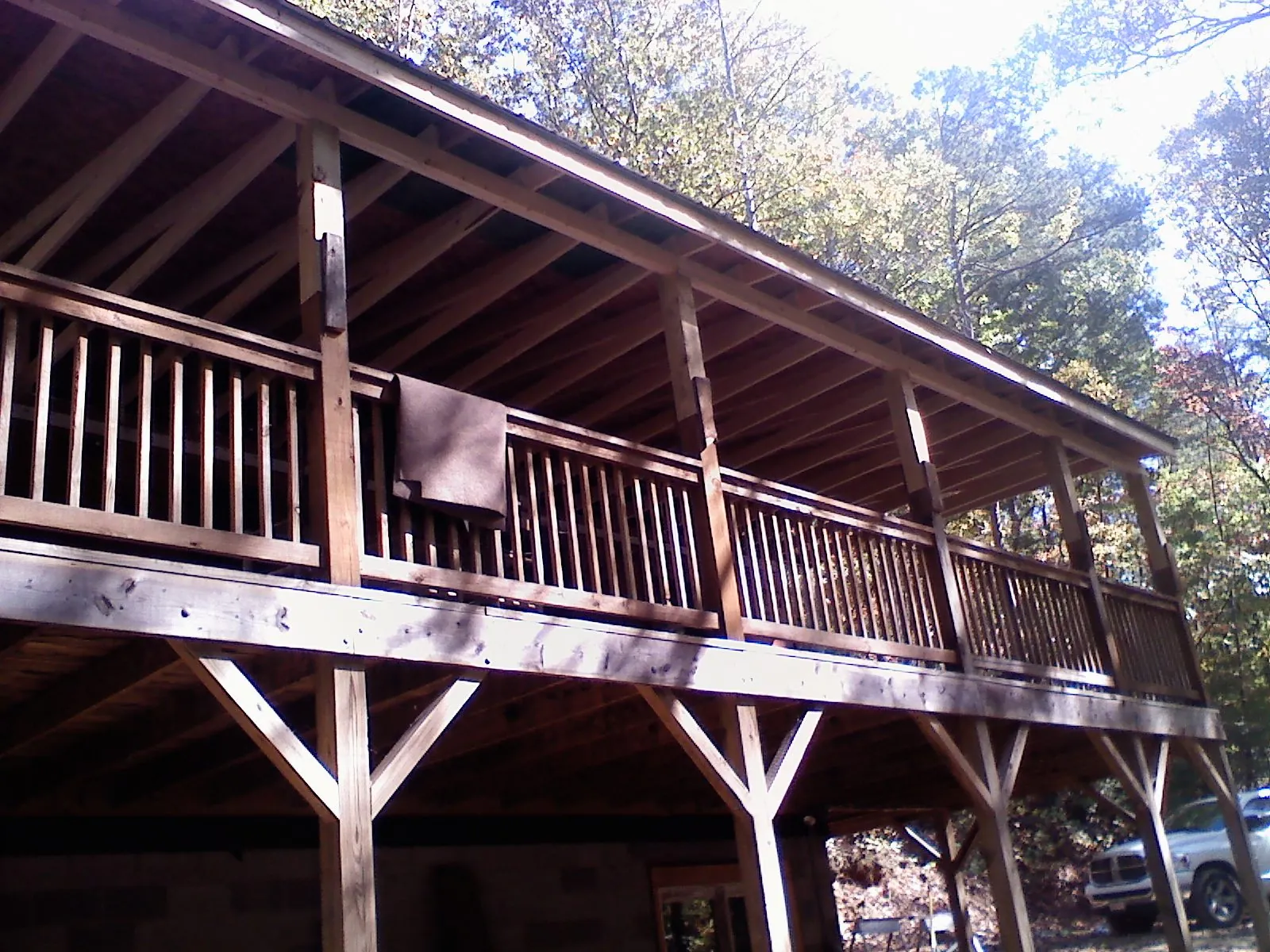 Timber framing under a new elevated porch and deck — Roof Leak Repair in Leonard by Roofing Brothers